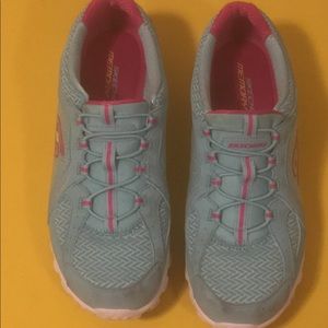 Teal and pink Skechers size 10